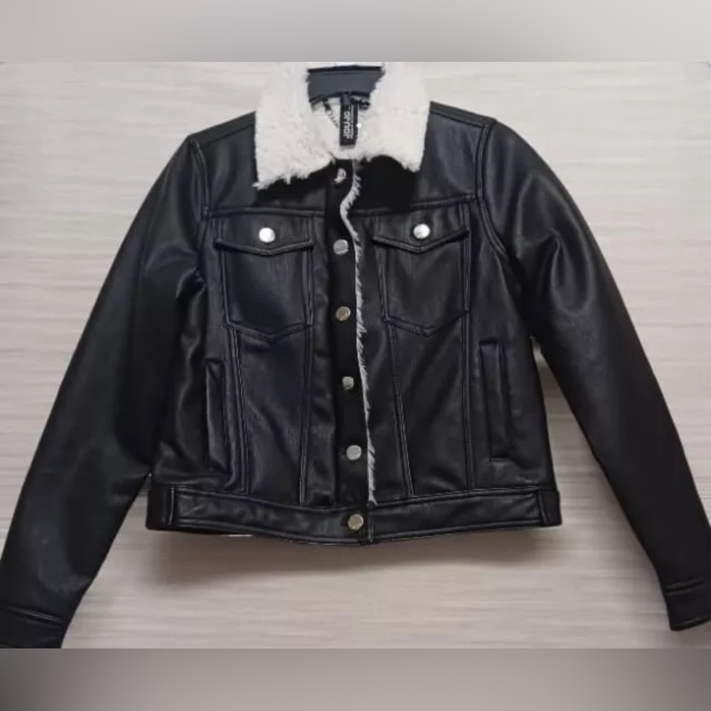 Gorgeous Leather jacket with white fur on the inside. Silver buttons